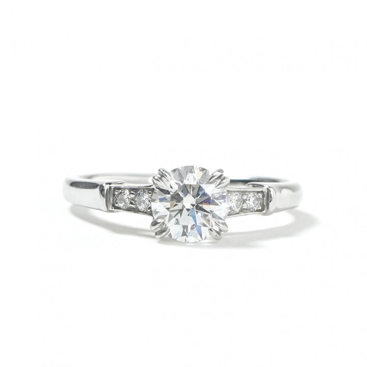ハリーウィンストン HARRY WINSTON ラウンドカット・トリスト・リング